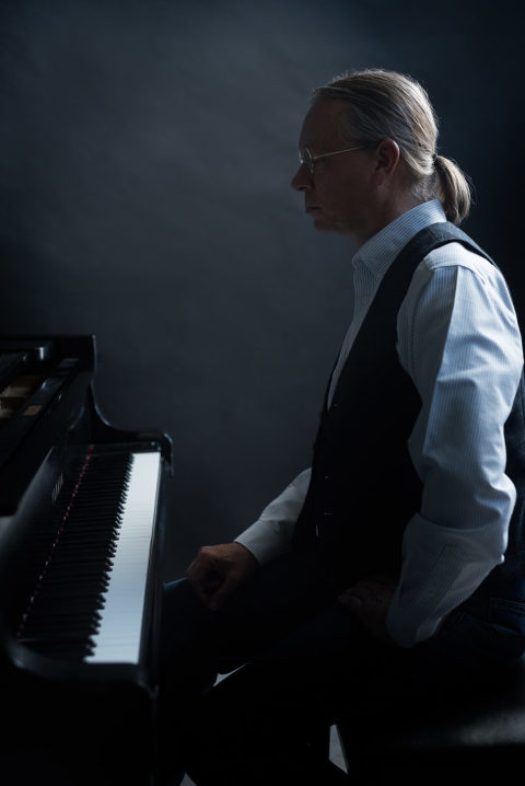 Portrait of Choral Music Educator Rob Westerberg at the Piano