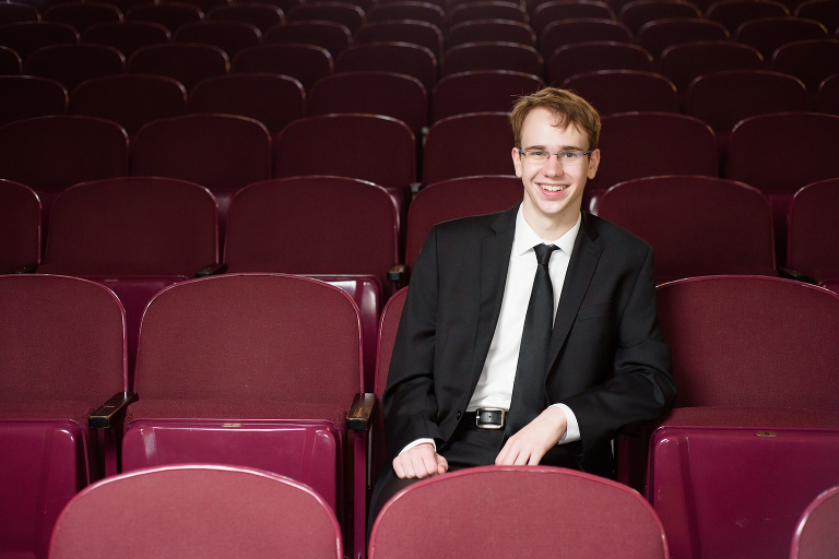 Portrait of Gregory, Class of 2018 Jazz Pianist in concert hall | Wohler & Co.